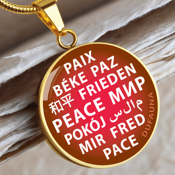 Peace circle necklace in 24 languages - steel or gold - white letters on pink background